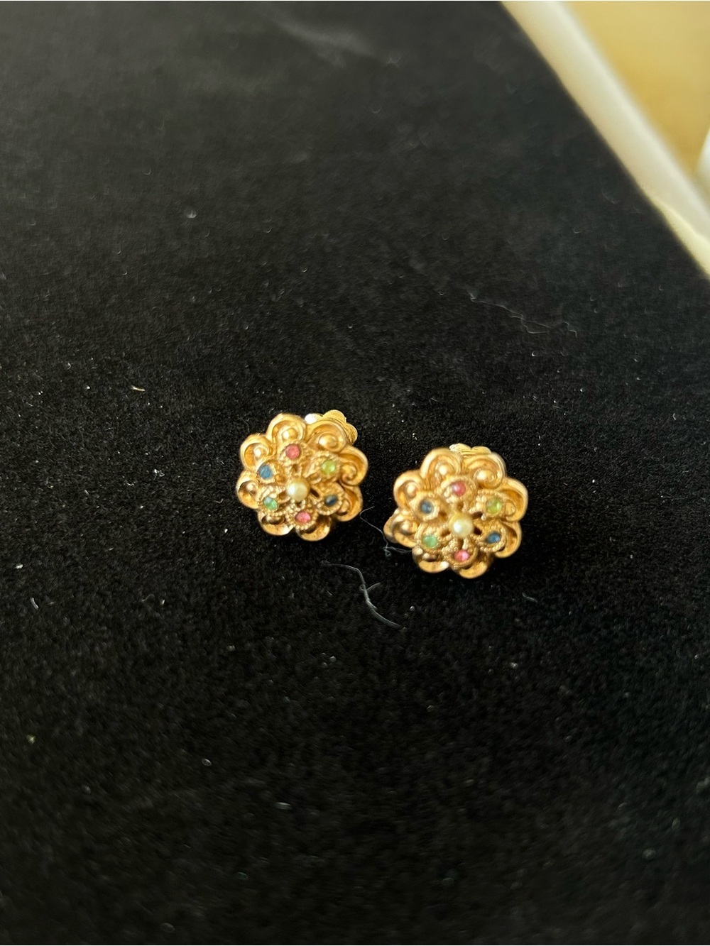Gold floral screw back vintage earrings with multicolored gemstones 
Vintage